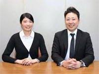 熊野友勝社長とホームページを担当する西村今日子さん　写真