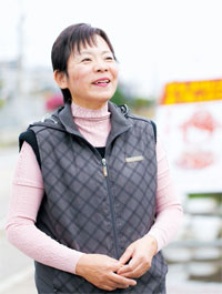 土日は自らたい焼きを焼き、新事業の成長をリードする北村眞理子専務　写真