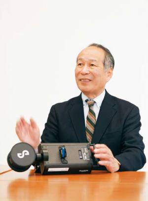 北原良彦社長の写真。新機器