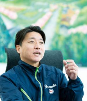 桒原社長の写真