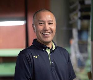 狭間則宏社長の写真