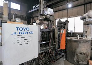 ダイカストマシンの写真。カセット システムにより、多品種小 ロットの生産に対応する。