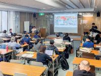 成果報告会での発表の様子の写真