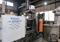 ダイカストマシンの写真。カセット システムにより、多品種小 ロットの生産に対応する。